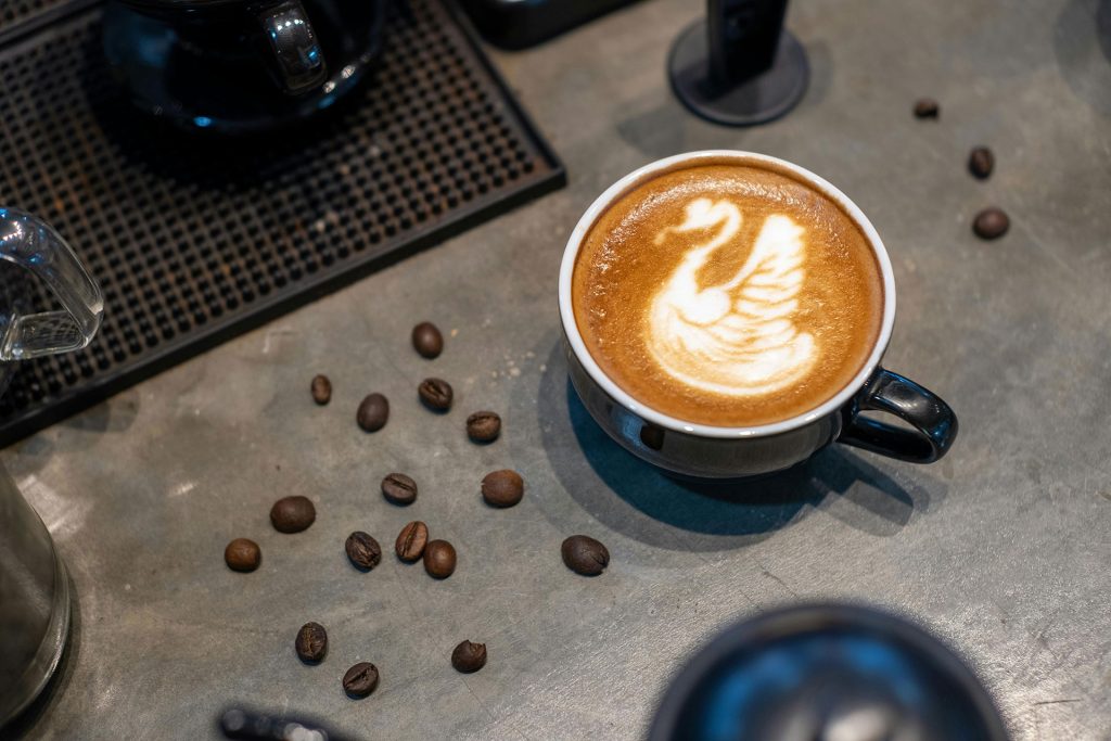 Cup of coffee on table at cafe